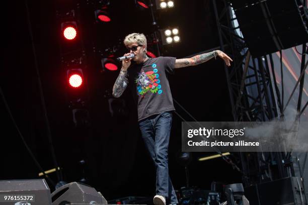 May 2018, Germany, Nuremberg: Singer of the US alternative rock band The Neighbourhood standing on stage at the open air festival 'Rock im Park'....