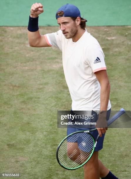 Lucas Pouille of France celebrates a point during his match against Milos Raonic of Canada during day 6 of the Mercedes Cup at Tennisclub Weissenhof...