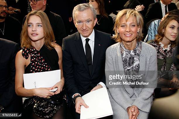 Natalia Vodianova, Bernard Arnault and Helene Arnault attend the Louis Vuitton Ready to Wear show as part of the Paris Womenswear Fashion Week...