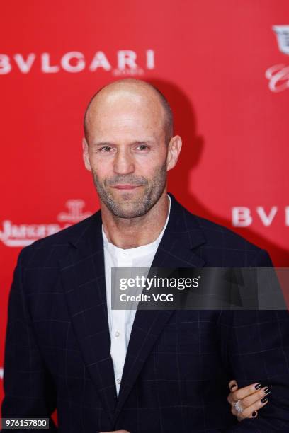 English actor Jason Statham arrives at the opening ceremony of the 21st Shanghai International Film Festival at Shanghai Grand Theatre on June 16,...