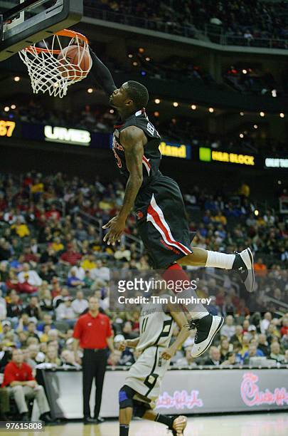 Guard Nick Okorie of the Texas Tech Red Raiders dunks on a breakaway in a game against the Colorado Buffaloes at the Sprint Center on March 10, 2010...