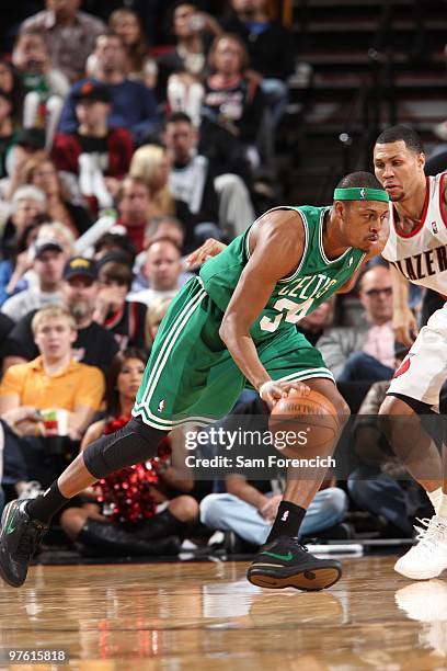 Paul Pierce of the Boston Celtics moves the ball against Brandon Roy of the Portland Trail Blazers during the game at The Rose Garden on February 19,...