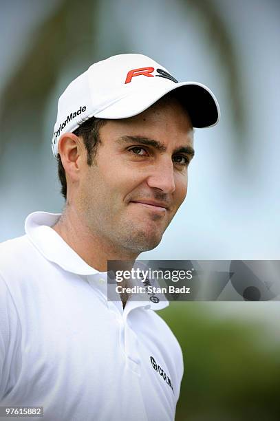 Edoardo Molinari of Italy smiles on the practice range during practice for the World Golf Championships-CA Championship at Doral Golf Resort and Spa...