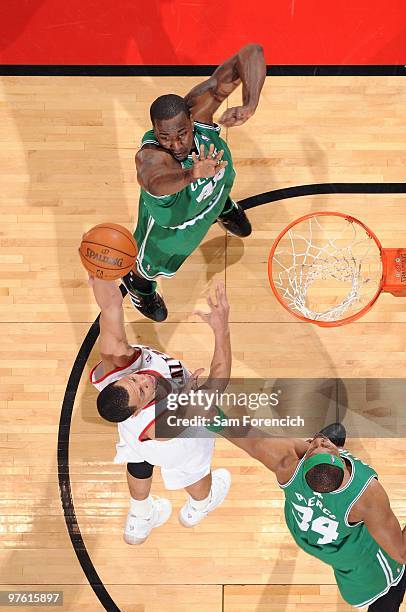 Brandon Roy of the Portland Trail Blazers shoots a layup against Paul Pierce and Kendrick Perkins of the Boston Celtics during the game at The Rose...