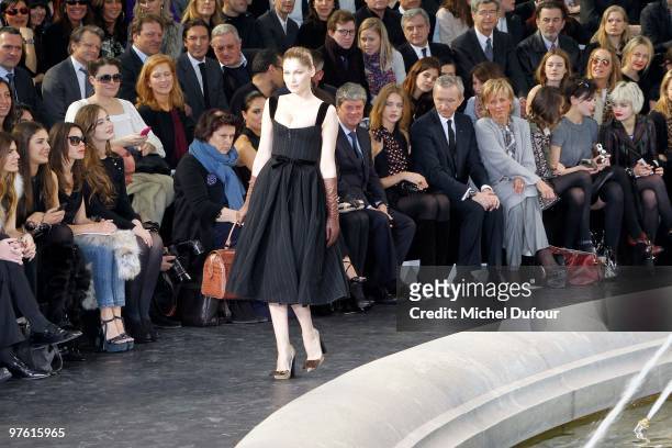 Laetitia Casta walks the runway during the Louis Vuitton Ready to Wear show as part of the Paris Womenswear Fashion Week Fall/Winter 2011 at Cour...