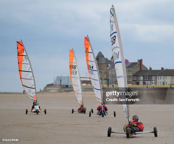 Competitors race during the National Land Sailing regatta held on Coatham Sands on June 16, 2018 in Redcar, England. Land sailing events held on the...