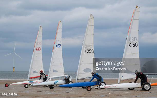 Competitors race during the National Land Sailing regatta held on Coatham Sands on June 16, 2018 in Redcar, England. Land sailing events held on the...