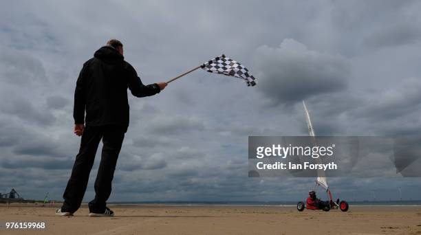 Competitors race during the National Land Sailing regatta held on Coatham Sands on June 16, 2018 in Redcar, England. Land sailing events held on the...