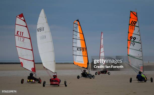 Competitors race during the National Land Sailing regatta held on Coatham Sands on June 16, 2018 in Redcar, England. Land sailing events held on the...