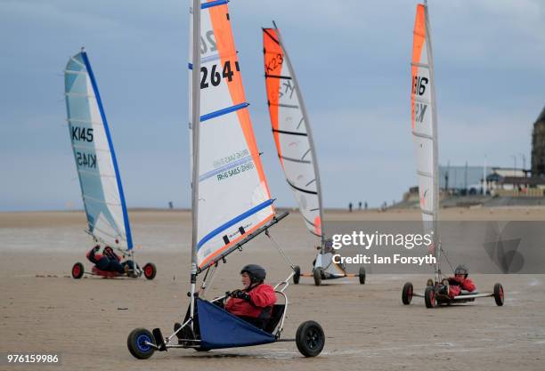 Competitors race during the National Land Sailing regatta held on Coatham Sands on June 16, 2018 in Redcar, England. Land sailing events held on the...