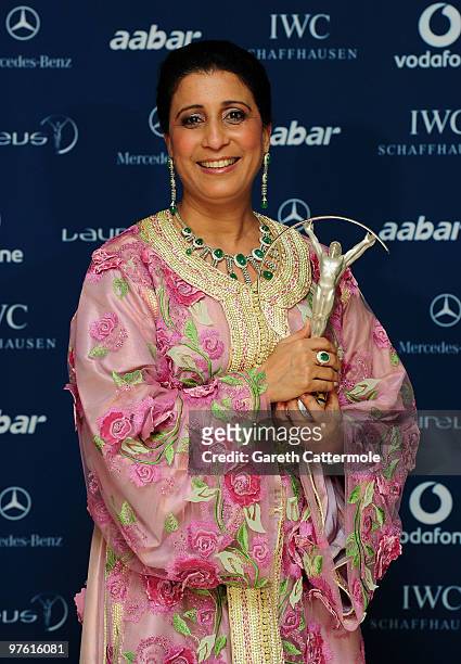 Nawal El Moutawakel becomes emotional while accepting her " Lifetime Acheivement" award on stage during the Laureus World Sports Awards 2010 at...