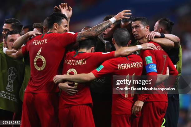 Cristiano Ronaldo of Portugal celebrates with team mates after scoring his team's second goal of the match during the 2018 FIFA World Cup Russia...