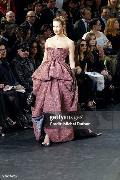 Elle McPherson walks the runway during the Louis Vuitton Ready to Wear show as part of the Paris Womenswear Fashion Week Fall/Winter 2011 at Cour...