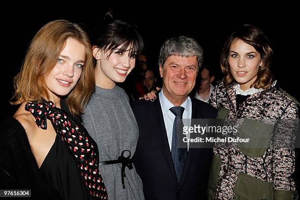 Natalia Vodianova, Daisy Lowe, Yves Carcelles and Alexa Chung attend the Louis Vuitton Ready to Wear show as part of the Paris Womenswear Fashion...