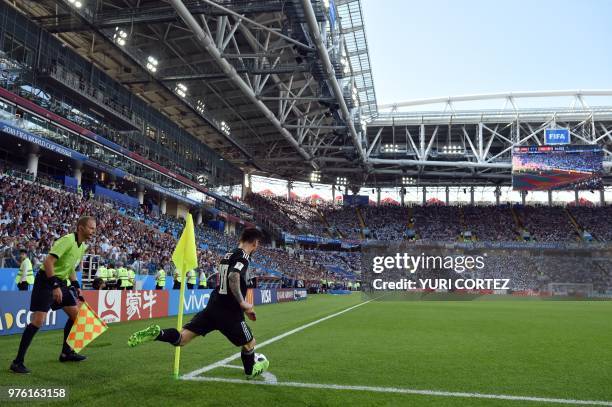 Argentina's forward Lionel Messi delivers a corner kick during the Russia 2018 World Cup Group D football match between Argentina and Iceland at the...