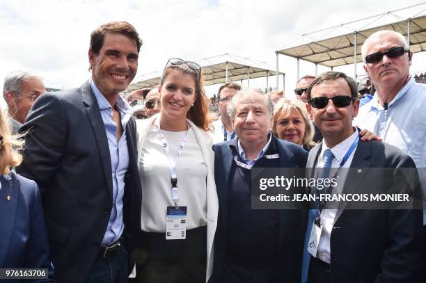 Spanish tennis player Rafael Nadal poses next French Junior Minister for Gender Equality Marlene Schiappa International Automobile Federation...