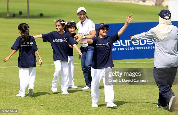 Laureus Sports Academy member Nawal El Moutawakel participates with the children during the Laureus Sport for Good Football Tournament at Emirates...