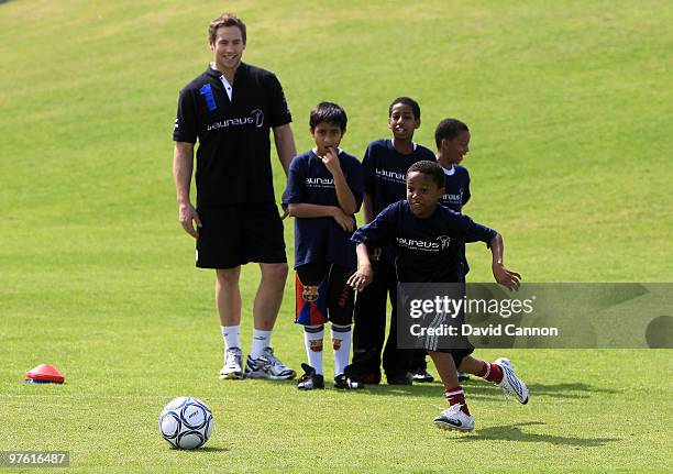 Butch James watches during the Laureus Sport for Good Football Tournament at Emirates Palace Hotel on March 10, 2010 in Abu Dhabi, United Arab...