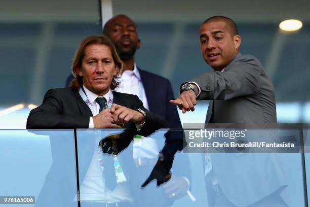 Former Spain player Michel Salgado talks with former France player David Trezeguet before the 2018 FIFA World Cup Russia group D match between...
