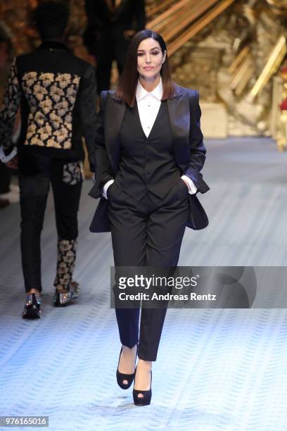 Monica Bellucci walks the runway at the Dolce & Gabbana show during Milan Men's Fashion Week Spring/Summer 2019 on June 16, 2018 in Milan, Italy.