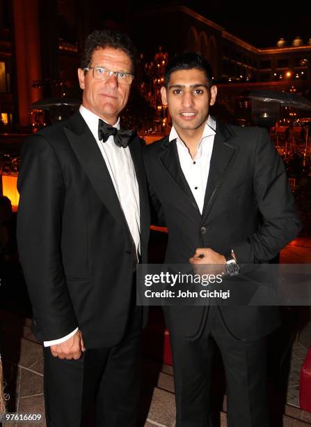 Fabio Capello and Amir Khan pose at the Awards Dinner during the Laureus World Sports Awards 2010 at Emirates Palace Hotel on March 10, 2010 in Abu...