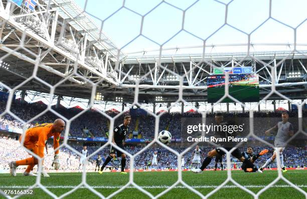 Alfred Finnbogason of Iceland scores his team's first goal past Wilfredo Caballero of Argentina during the 2018 FIFA World Cup Russia group D match...