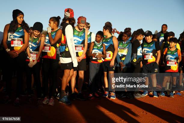Runners wait for the start of the Deadly Fun Run during the the National Deadly Fun Run Championships on June 16, 2018 in Uluru, Australia. The...