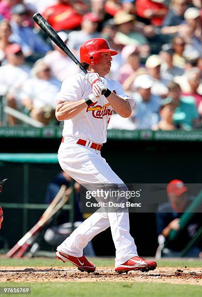 Centerfielder Colby Rasmus of the St Louis Cardinals hits a double against the Washington Nationals at Roger Dean Stadium on March 10, 2010 in...