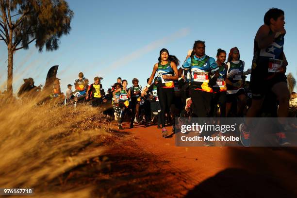 Runners take part in the Deadly Fun Run during the the National Deadly Fun Run Championships on June 16, 2018 in Uluru, Australia. The annual running...