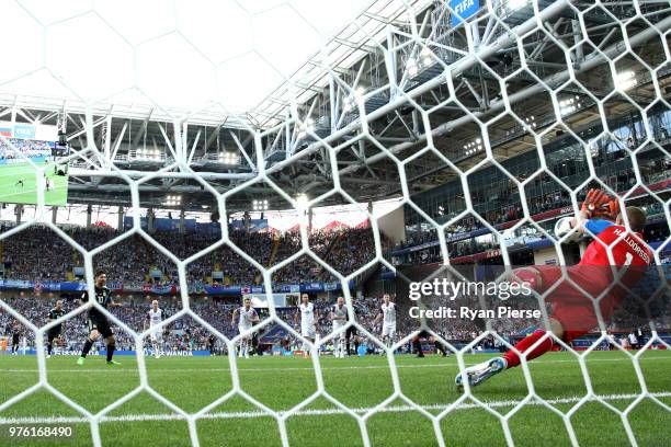 Hannes Halldorsson of Iceland saves a penalty from Lionel Messi of Argentina during the 2018 FIFA World Cup Russia group D match between Argentina...