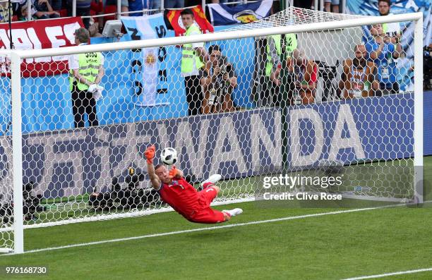 Hannes Halldorsson of Iceland saves a penalty kick from Lionel Messi of Argentina during the 2018 FIFA World Cup Russia group D match between...