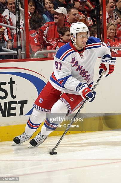 Matt Gilroy of the New York Rangers handles the puck against the Washington Capitals March 6, 2010 at the Verizon Center in Washington DC.