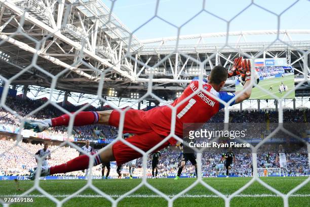 Hannes Halldorsson of Iceland saves a penalty kick from Lionel Messi of Argentina during the 2018 FIFA World Cup Russia group D match between...