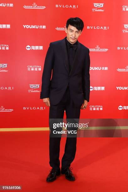 Actor Chang Chen arrives at the opening ceremony of the 21st Shanghai International Film Festival at Shanghai Grand Theatre on June 16, 2018 in...