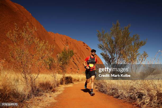 Runner competes during the Uluru Relay Run as part of the National Deadly Fun Run Championships on June 16, 2018 in Uluru, Australia. The annual...