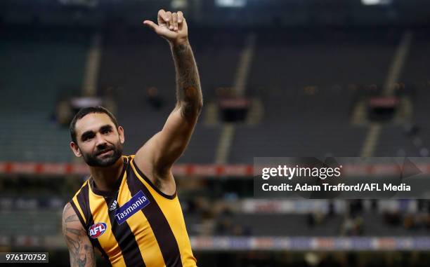 Shaun Burgoyne of the Hawks is chaired off the field after his 350th match by Jarryd Roughead and Ben Stratton of the Hawks during the 2018 AFL round...