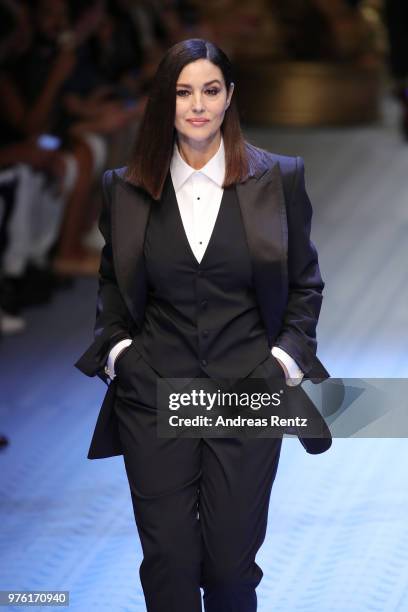 Monica Bellucci walks the runway at the Dolce & Gabbana show during Milan Men's Fashion Week Spring/Summer 2019 on June 16, 2018 in Milan, Italy.