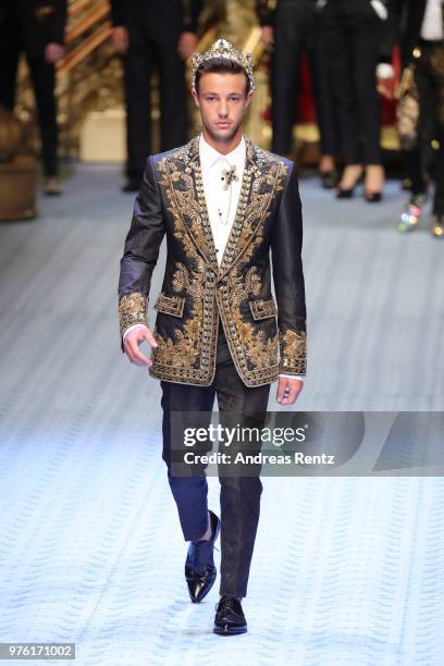 Cameron Dallas walks the runway at the Dolce & Gabbana show during Milan Men's Fashion Week Spring/Summer 2019 on June 16, 2018 in Milan, Italy.