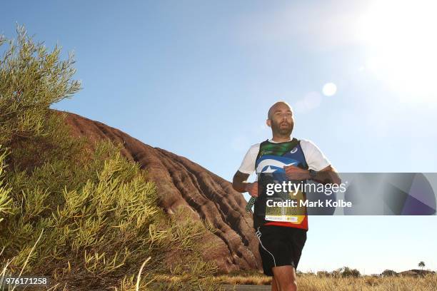 Runner from the Murray Lands team is seen as he competes during the Uluru Relay Run as part of the National Deadly Fun Run Championships on June 16,...