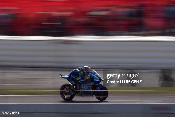 Team Suzuki Ecstars Spain's rider Alex Rins rides during the Catalunya MotoGP Grand Prix third free practice session at the Catalunya racetrack in...