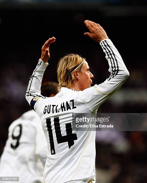 Guti of Real Madrid celebrates his team's first goal during the UEFA Champions League round of sixteen, second leg match between Real Madrid and Lyon...