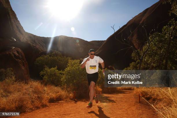 Australian olympic bobsledder Lachlan Reidy competes in the Uluru Relay Run as part of the National Deadly Fun Run Championships on June 16, 2018 in...