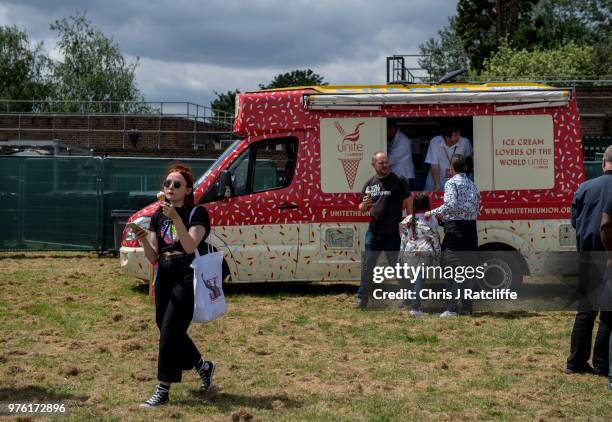 Festival attendees receive free ice creams from a Unite the Union ice cream van at Labour Live, White Hart Lane, Tottenham on June 16, 2018 in...