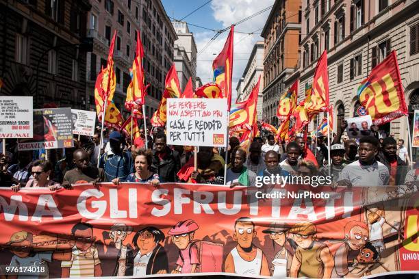 Demonstrators protest during a march 'Prima gli sfruttati' organized by Italy's USB against the murder of the USB syndicalist Soumaila Sacko and the...