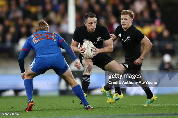 Ben Smith of the All Blacks makes a run during the International Test match between the New Zealand All Blacks and France at Westpac Stadium on June...