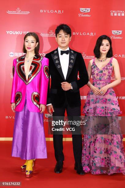 Actress Sammi Cheng, actor David Tong Dawei and actress and singer Charlene Choi arrive at the opening ceremony of the 21st Shanghai International...