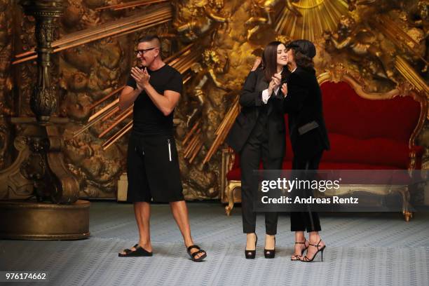 Stefano Gabbana, Monica Bellucci and Marpessa Hennink walk the runway at the Dolce & Gabbana show during Milan Men's Fashion Week Spring/Summer 2019...