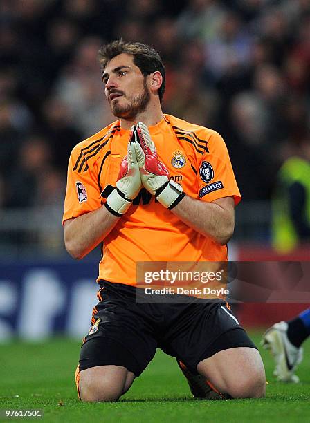 Iker Casillas of Real Madrid reacts after Olympique Lyonnais scored their first goal during the UEFA Champions League round of 16 2nd leg match...
