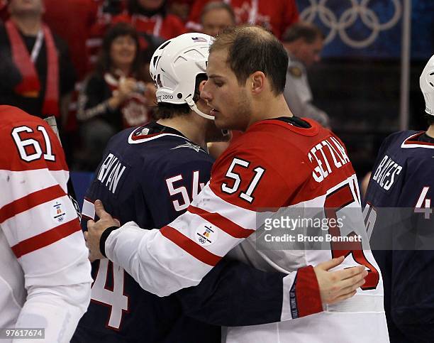 Bobby Ryan of USA and Ryan Getzlaf of Canada hug after the ice hockey men's gold medal game between USA and Canada on day 17 of the Vancouver 2010...