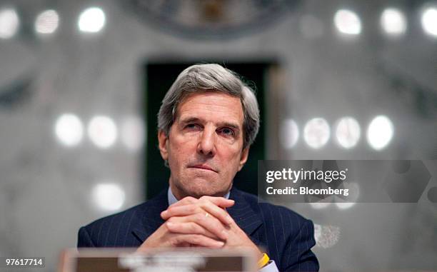John Kerry, a Democrat from Massachusetts and chairman of the Senate Foreign Relations Committee, listens during a hearing on global health in...